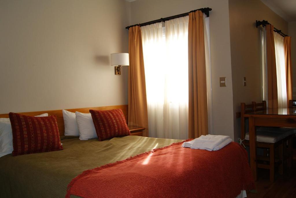 Patagonia Suites Trelew Quarto foto